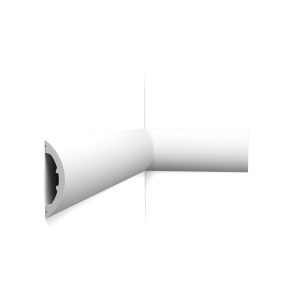 Orac P3070 curved wall panel moulding with smooth rounded profile installed on interior wall corner