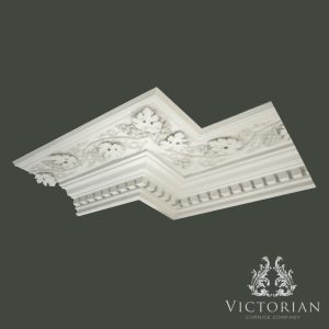 Decorative plaster cornice with grape and vine detail and dentil block design by Victorian Cornice Company