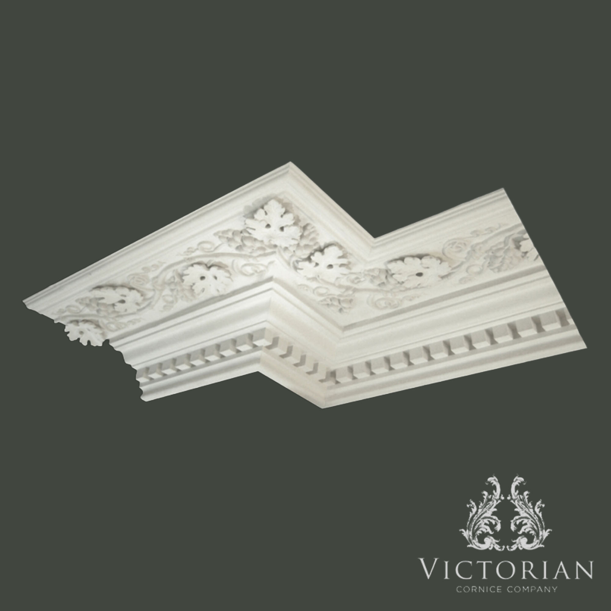Decorative plaster cornice with grape and vine detail and dentil block design by Victorian Cornice Company