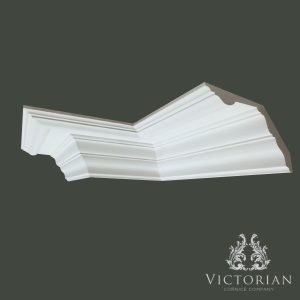 Edwardian plaster cornice with layered stepped detailing and elegant curved traditional profile