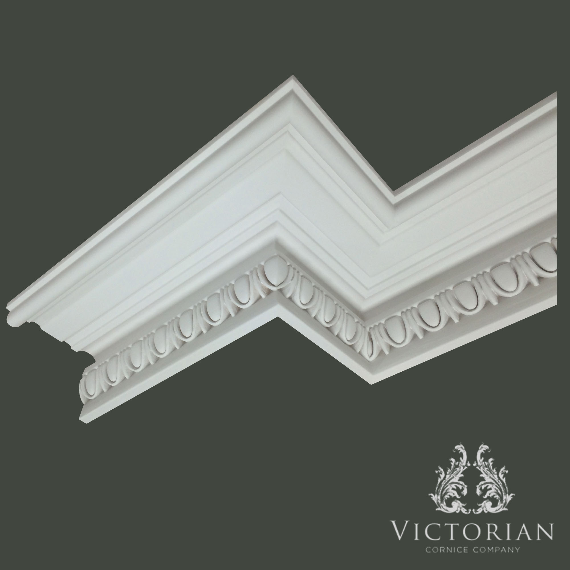 Egg and dart plaster cornice viewed from below showing detailed classical ornament and layered profile