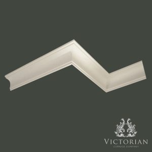 Traditional cavetto plaster cornice with smooth curved profile and understated classical detailing