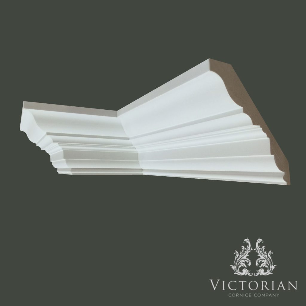 C64 Georgian plaster cornice with bold stepped profile and smooth sweeping upper curve