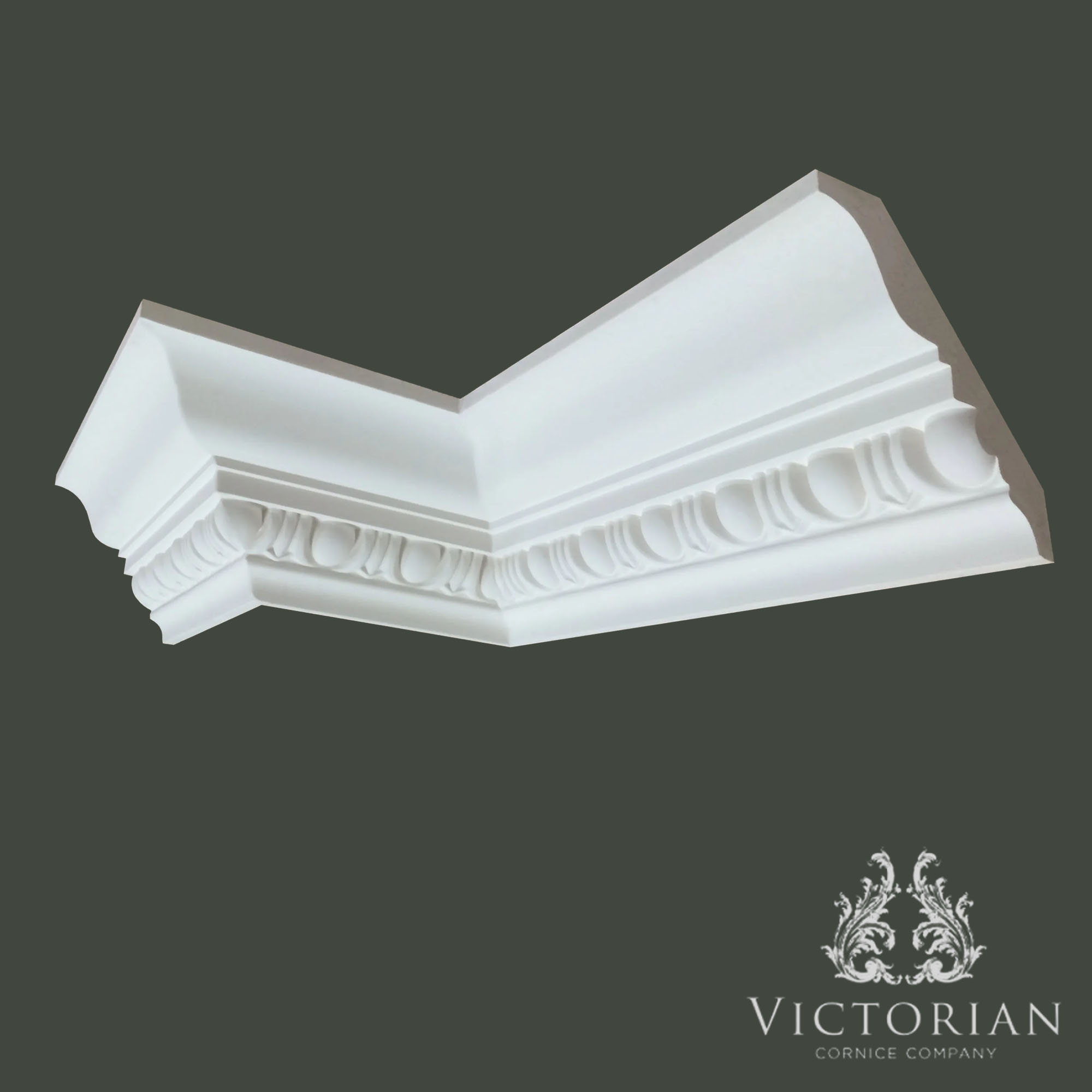 C83 decorative plaster cornice featuring a traditional egg and dart enrichment with a deep sweeping profile and classical detailing.
