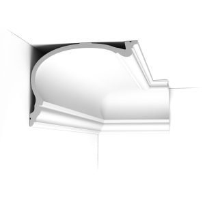 C343 Orac Purotouch cornice installed in a room corner, featuring a large deep curved profile with stepped detailing.