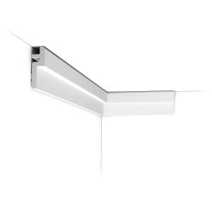 ORAC C394 minimalist cornice profile installed at the wall and ceiling junction, featuring a sleek recessed design suitable for indirect LED lighting.