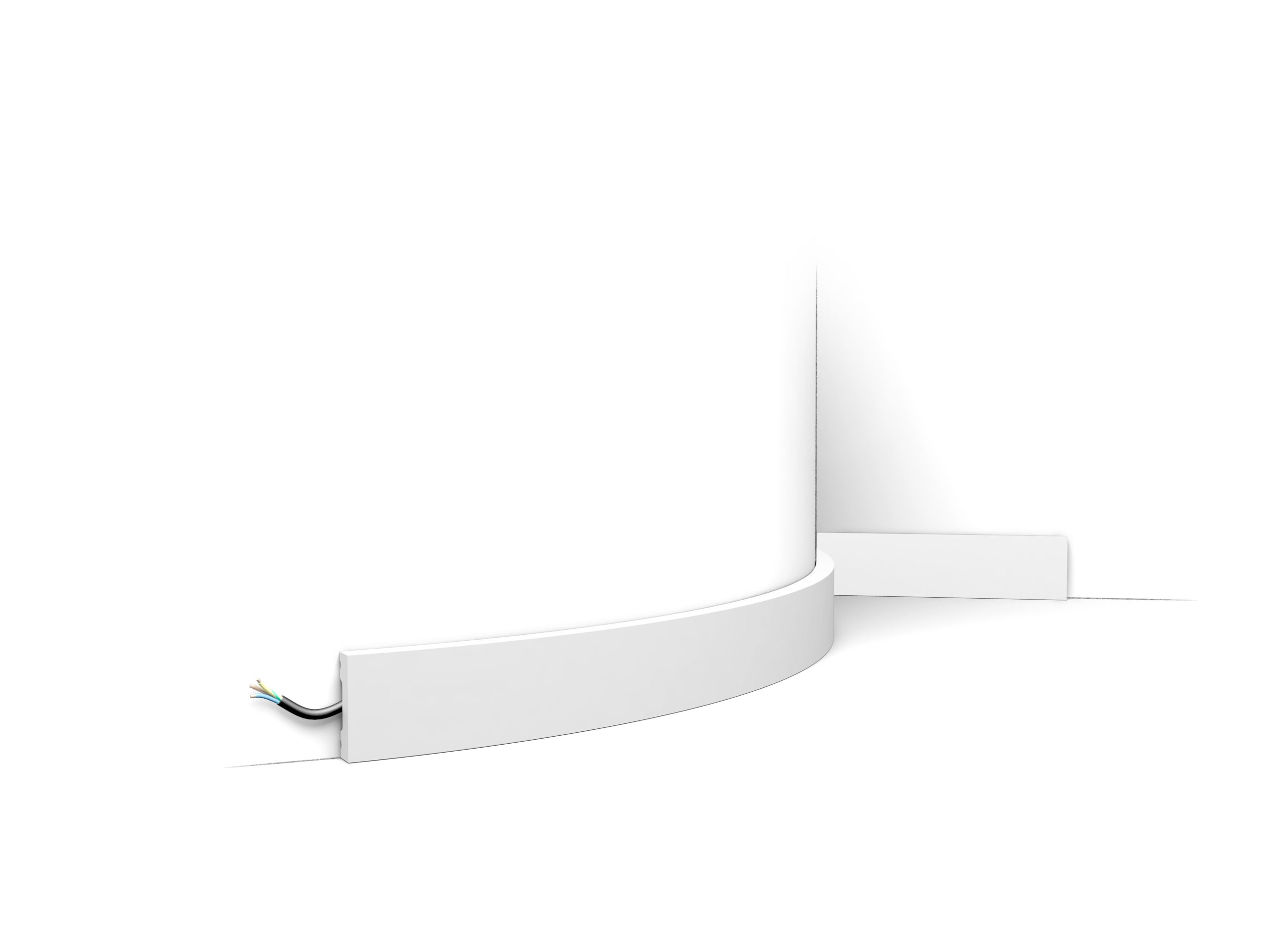Flexible skirting board with soft edge fitted to curved wall with concealed cable channel