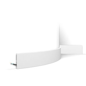 Flexible tall skirting board fitted to curved wall with concealed cable channel