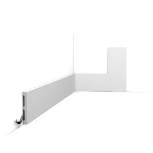 Modern flat skirting board RAL 9003 white with concealed cable channel installed in room corner