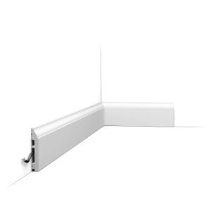 Orac SX172 skirting board installed with cable management feature in corner detail