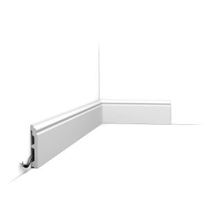 Orac SX173 skirting board installed corner detail with cable management