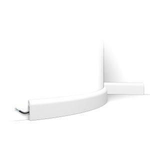 Flexible bullnose skirting board fitted to curved wall with concealed cable channel