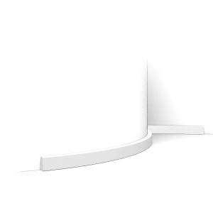 Flexible low profile skirting trim fitted to curved wall