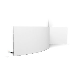 Flexible flat skirting board fitted to curved wall with concealed cable channel