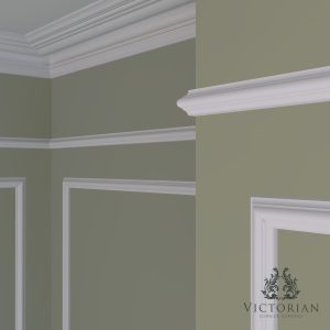 P1 handmade plaster dado rail installed on a traditional interior wall with decorative panel mouldings and plaster cornice.