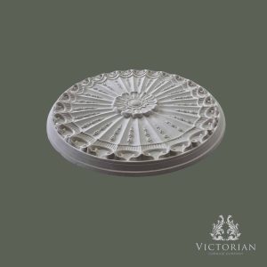 Side profile of the R10 handmade plaster ceiling rose showing its projection, raised floral centre and decorative scroll border.