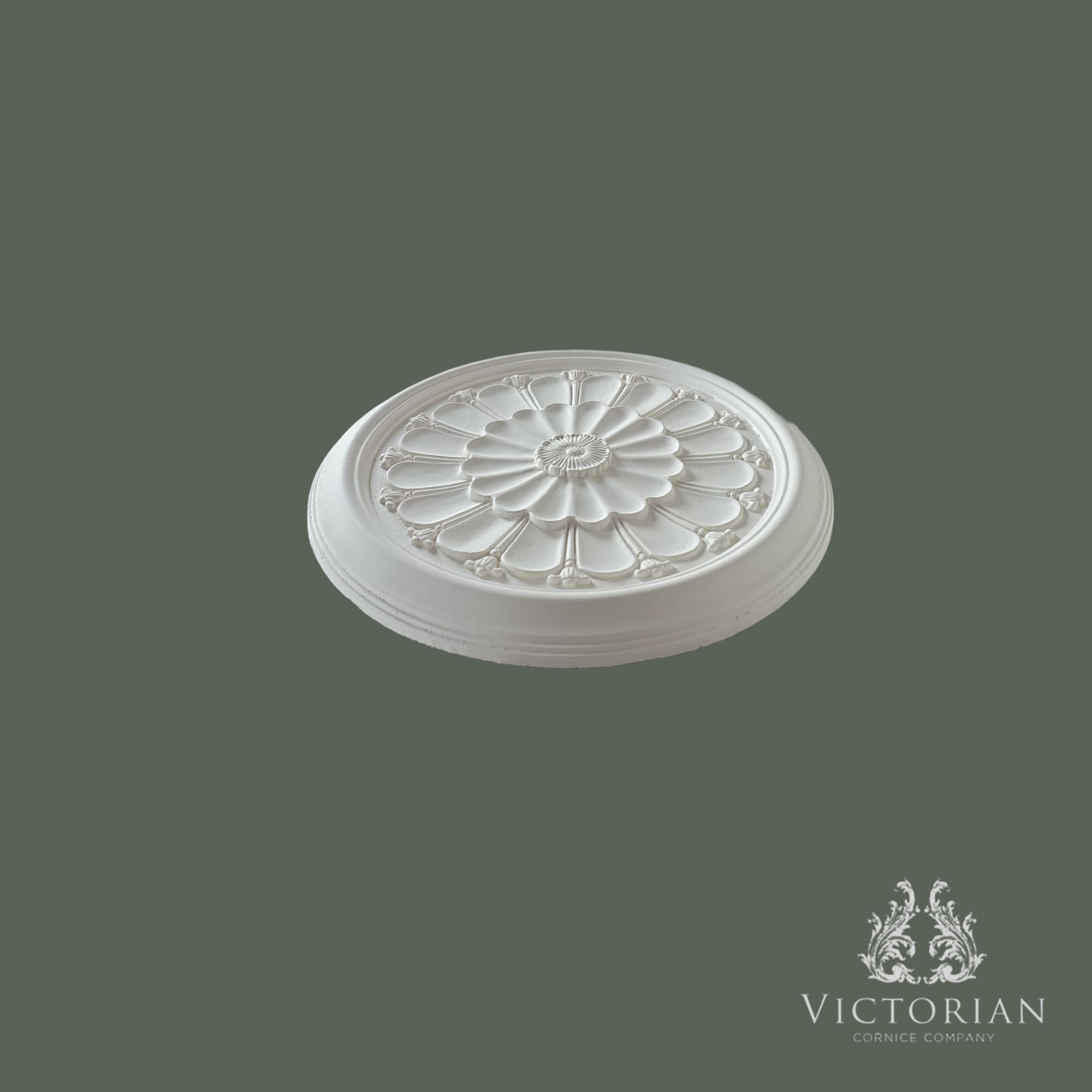 Side profile of the R15 handmade plaster ceiling rose showing its shallow projection, floral centre and radiating petal detailing.