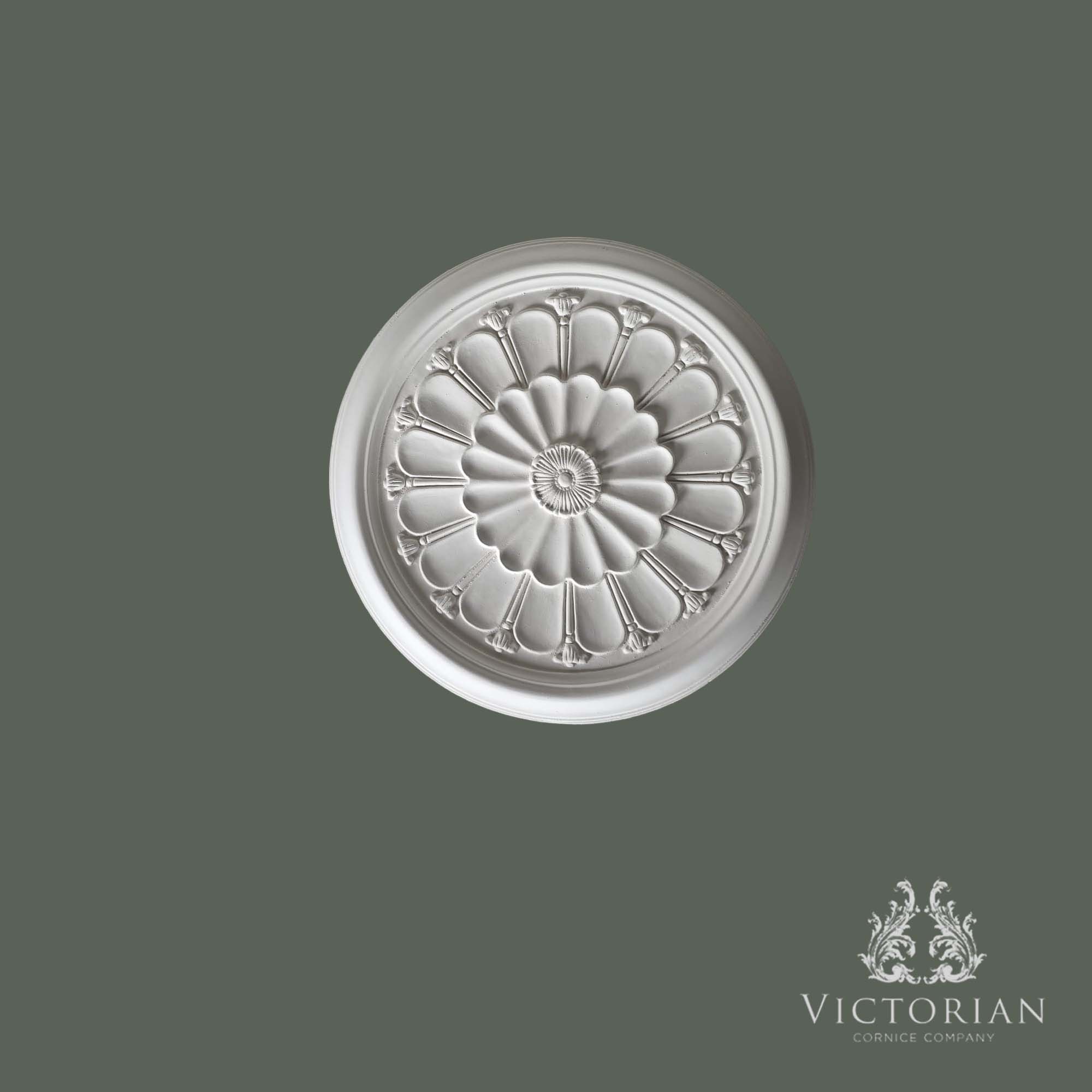 Front view of the R15 handmade plaster ceiling rose featuring a central flower, radiating petal design and smooth outer border.