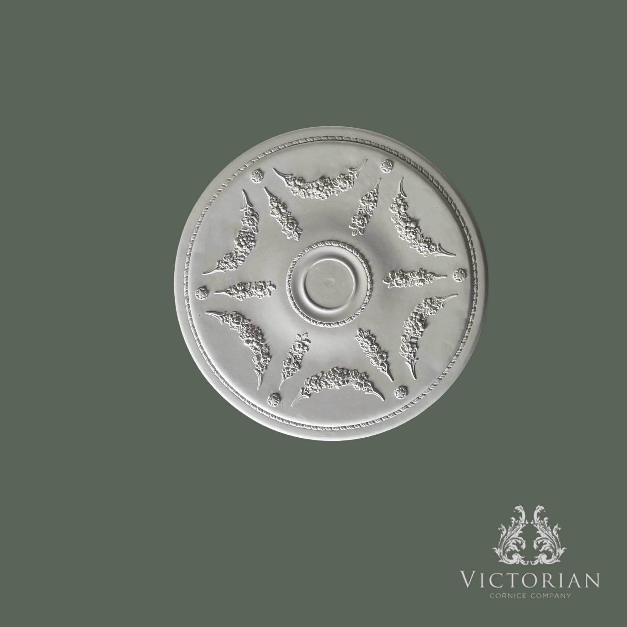 Front view of the R23 handmade plaster ceiling rose featuring delicate floral garlands radiating from a plain central boss with a fine rope border.