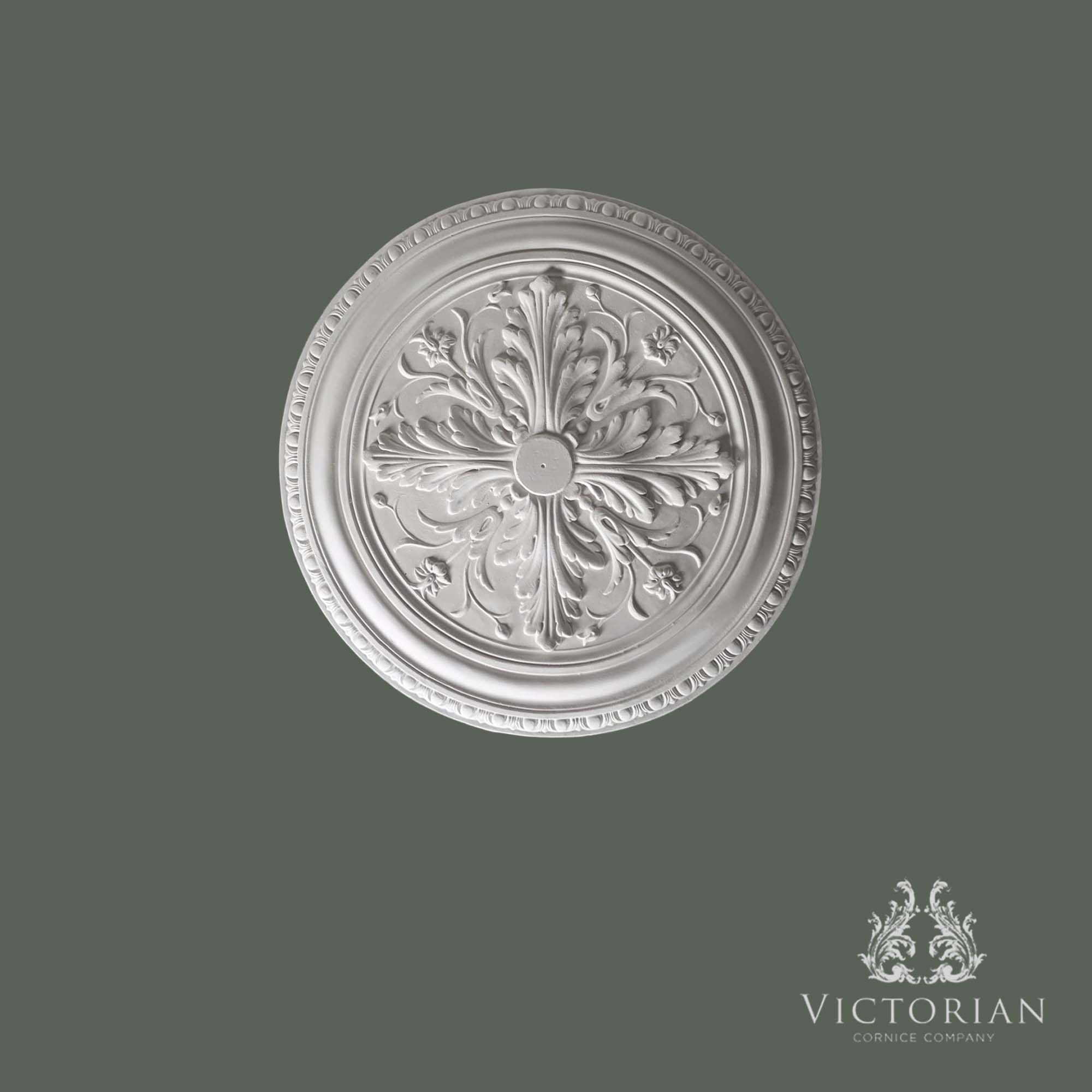 Front view of the R35 handmade plaster ceiling rose featuring a bold acanthus leaf design, decorative foliage and a classic egg-and-dart outer border.