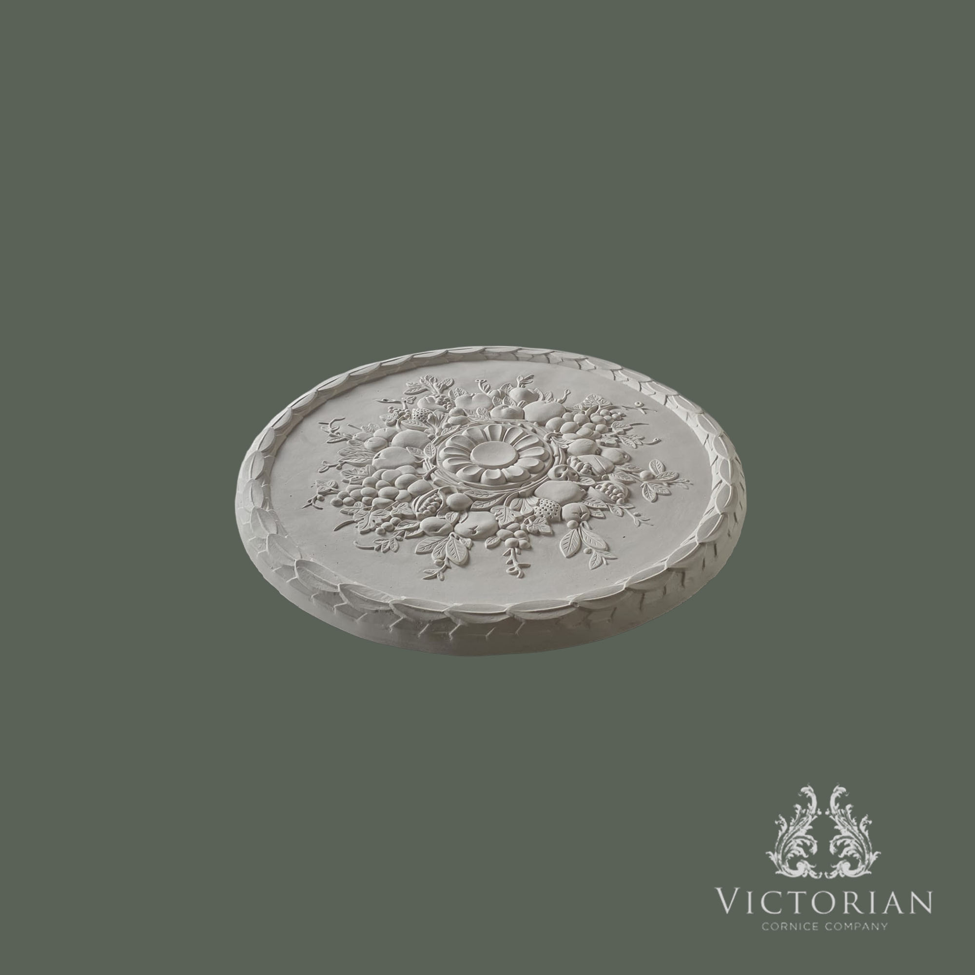 Side profile of the R36 handmade plaster ceiling rose featuring a decorative fruit and floral centre with a traditional laurel leaf border.