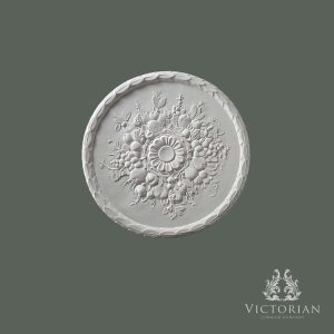 R36 handmade plaster ceiling rose featuring a detailed fruit and foliage wreath surrounding a decorative central flower, 550mm diameter.
