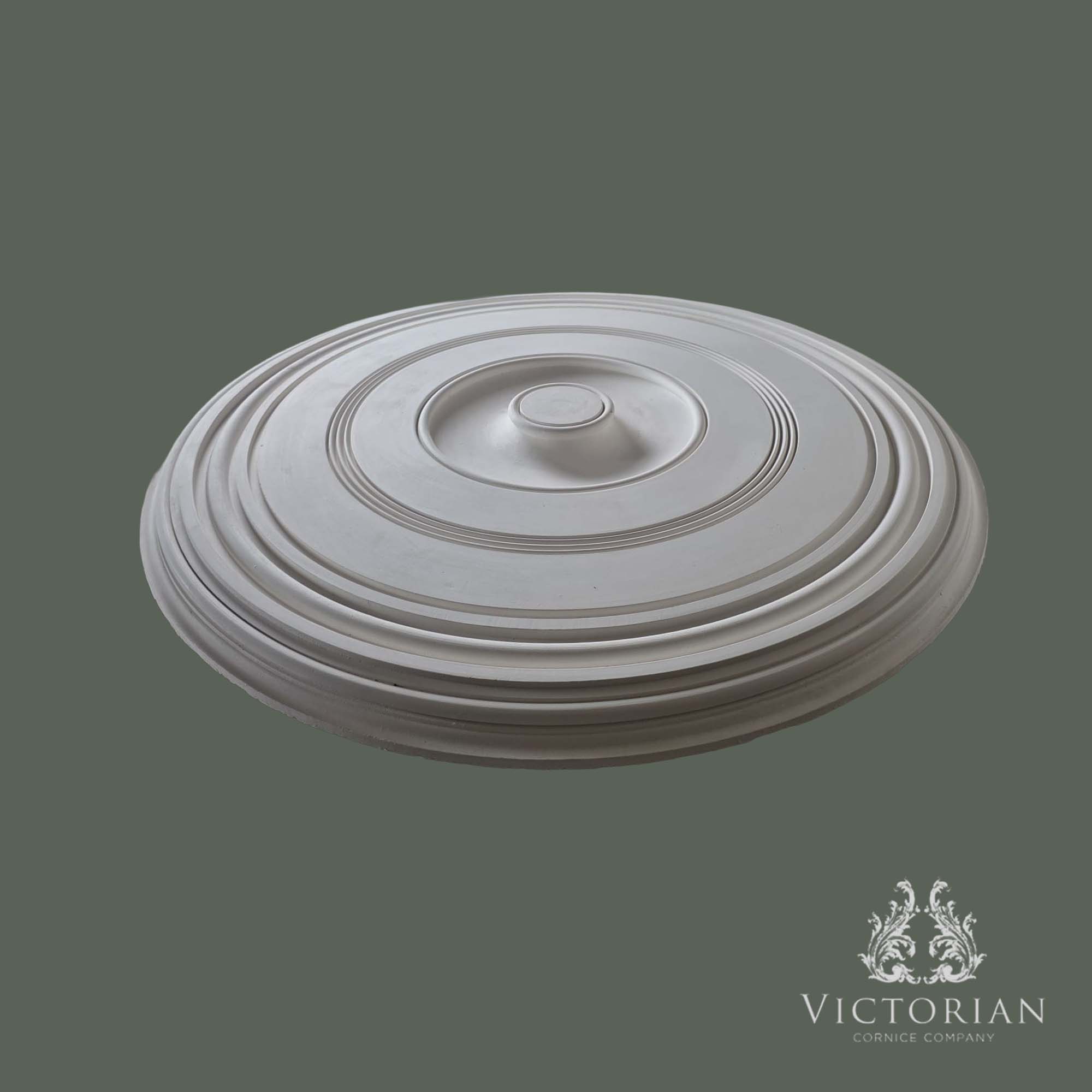 Side profile of the R44 plaster ceiling rose showing its smooth stepped rings and domed centre.