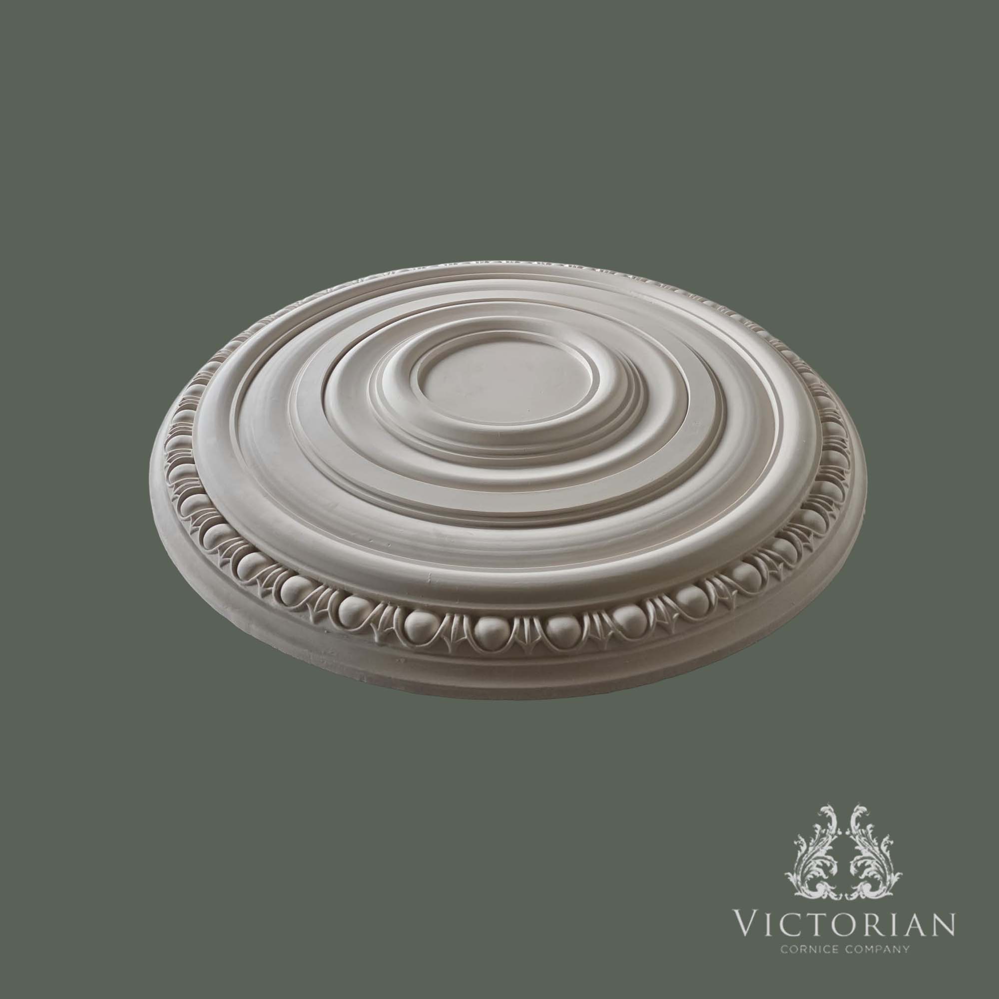 Side profile of the R47 handmade plaster ceiling rose showing its domed concentric stepped profile and decorative egg and dart border.
