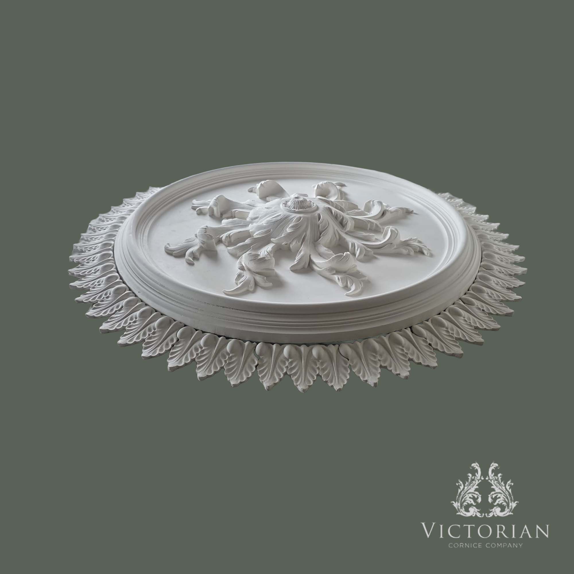 Side profile of the R49 multi-piece plaster ceiling rose showing its layered construction, raised acanthus centre and decorative leaf border.