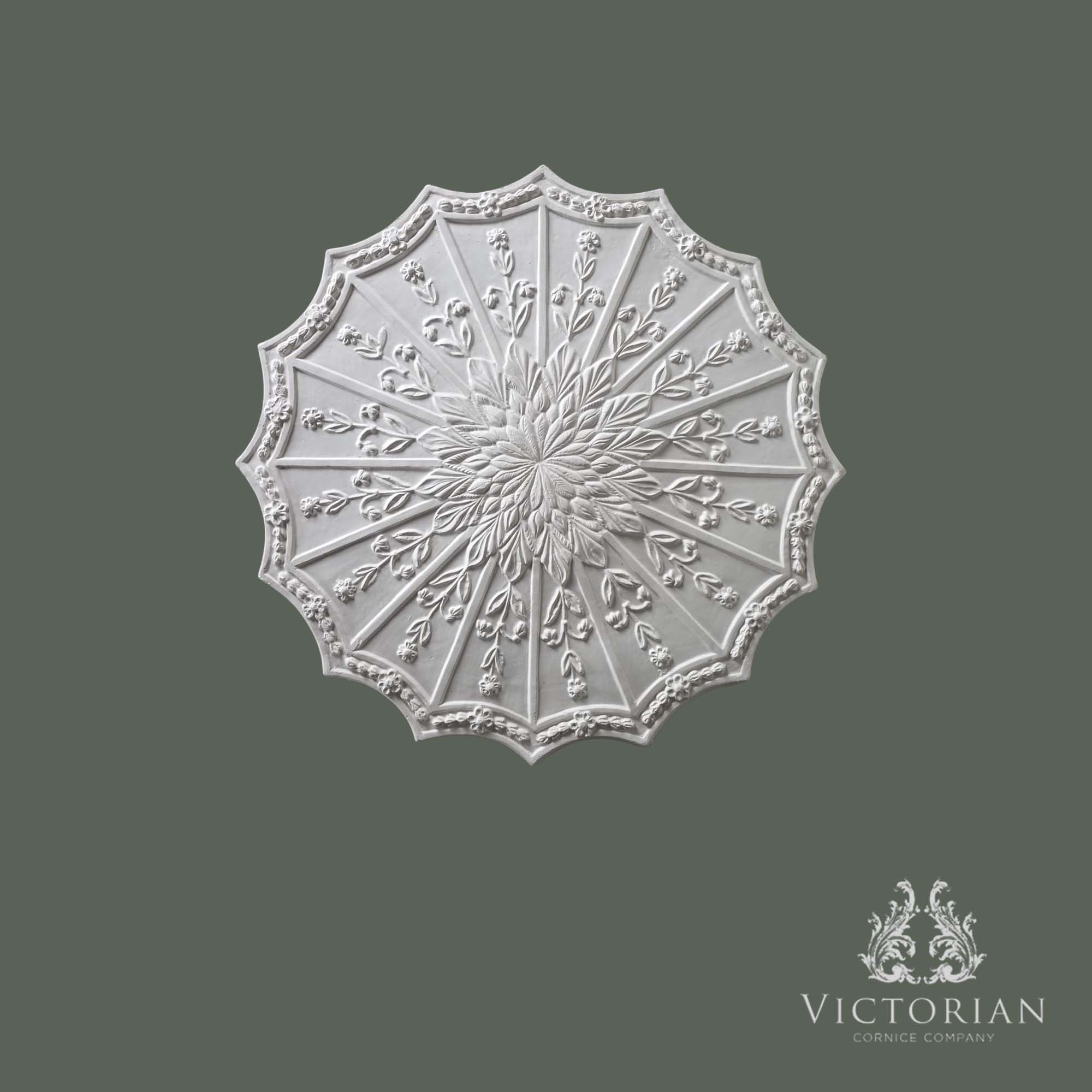 R66 handmade plaster ceiling rose with floral centre, radiating leaf design and decorative scalloped edge, 550mm diameter.