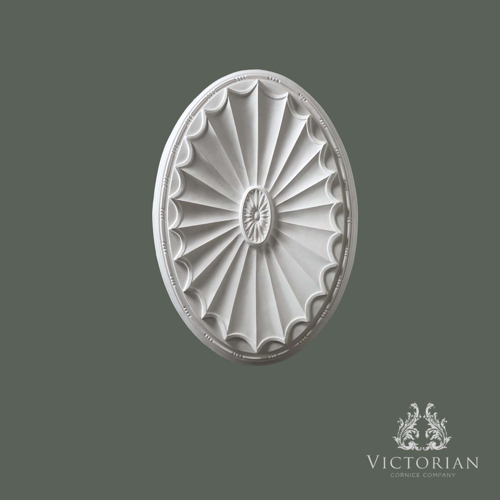 Front view of the R7 handmade oval plaster ceiling rose with a traditional fluted fan design and decorative floral centre.