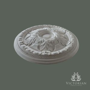 Side profile of the R70 handmade plaster ceiling rose showing its raised acanthus leaf design, deep relief, and decorative egg and dart border.