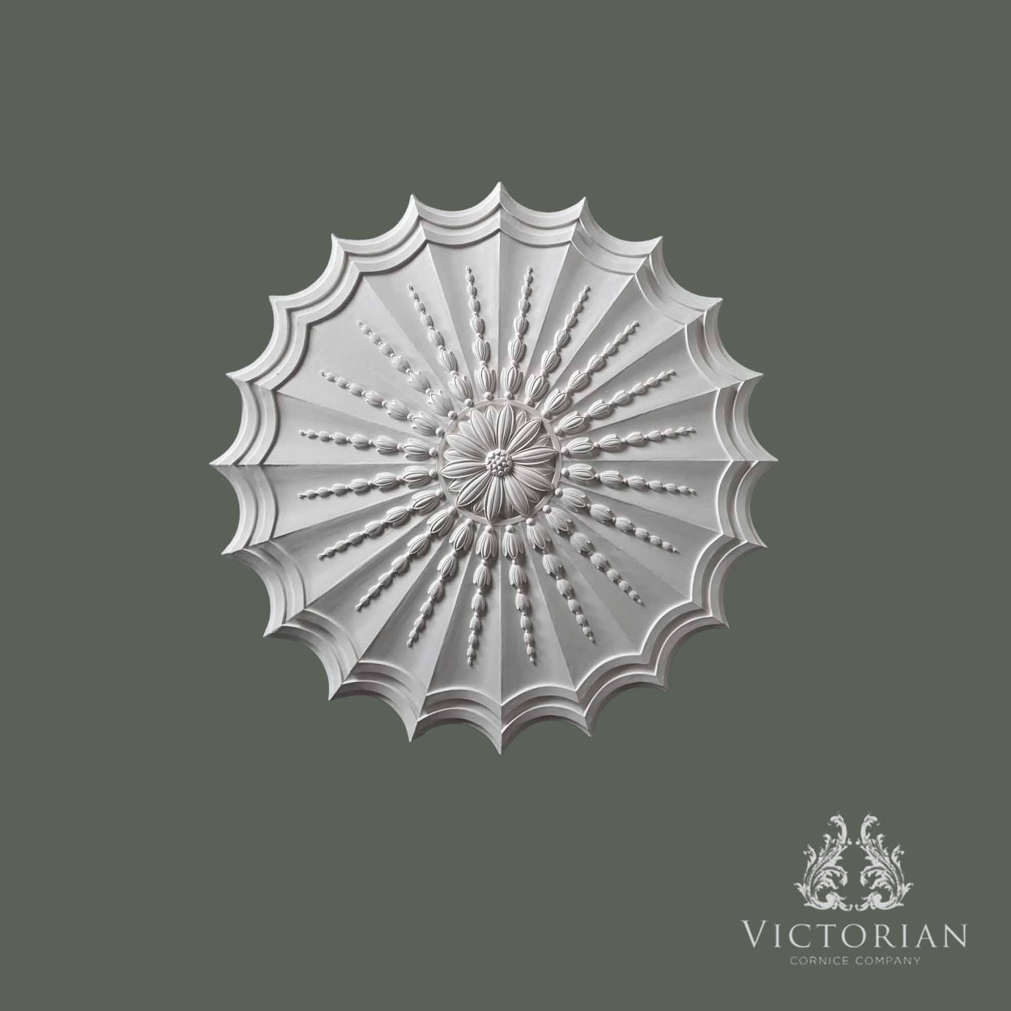 Front view of the R71 handmade plaster ceiling rose featuring a scalloped edge, radiating bead detailing and a decorative floral centre.