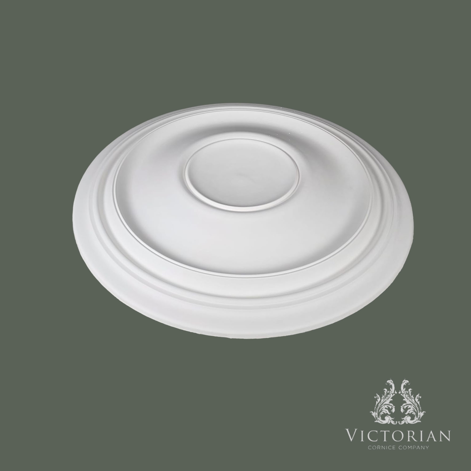 Side profile of the R73 plaster ceiling rose showing its smooth recessed centre and gently stepped moulded profile.