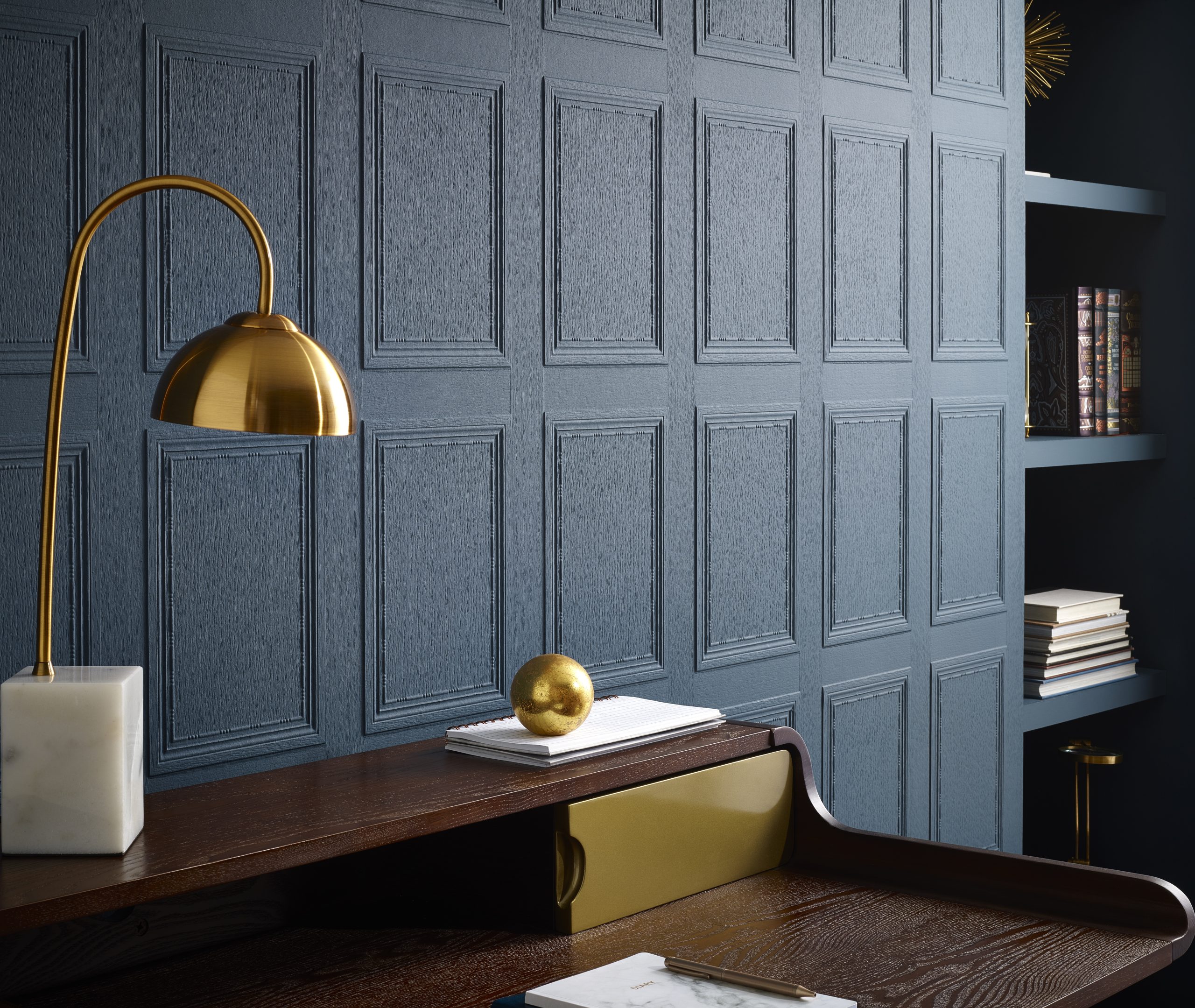 Lincrusta wallcovering in painted blue panel design with classic embossed texture