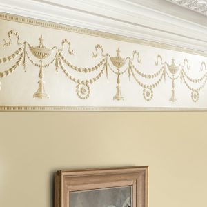 Lincrusta RD1955FR Adam Frieze installed beneath decorative plaster cornice in a traditional interior
