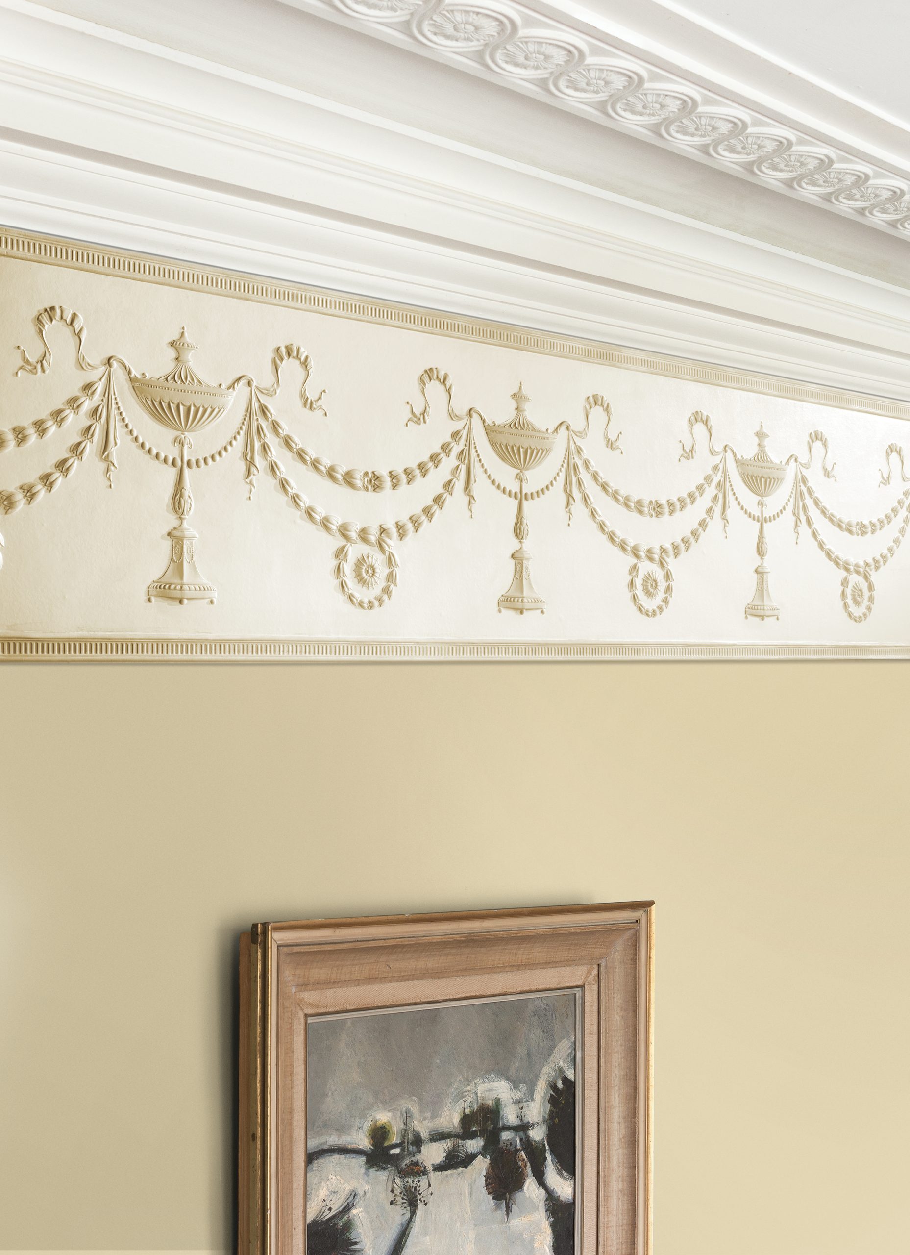 Lincrusta RD1955FR Adam Frieze installed beneath decorative plaster cornice in a traditional interior