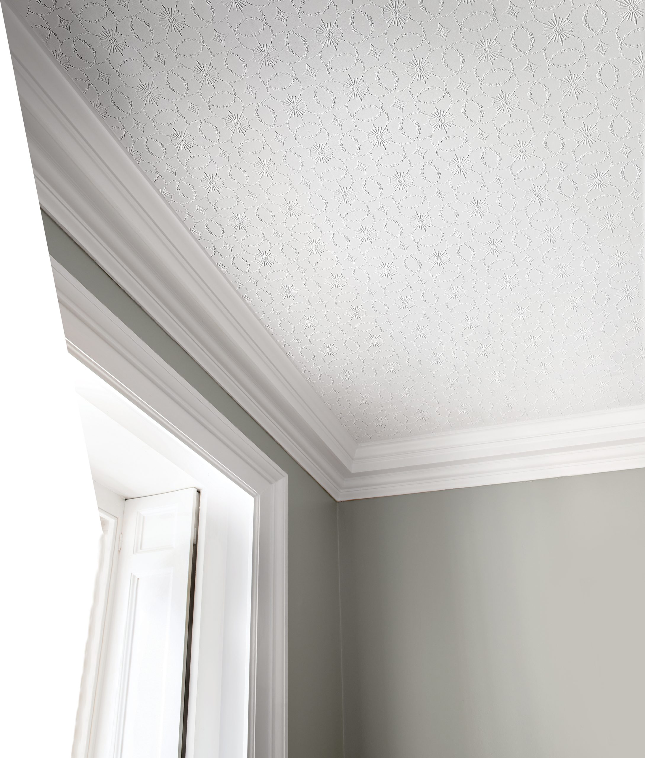 Lincrusta Amelia embossed ceiling covering with geometric starburst pattern and decorative cornice