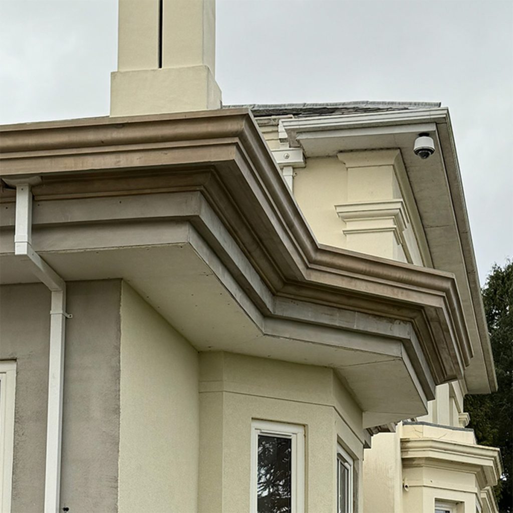 Exterior cornice and decorative mouldings on bay window property