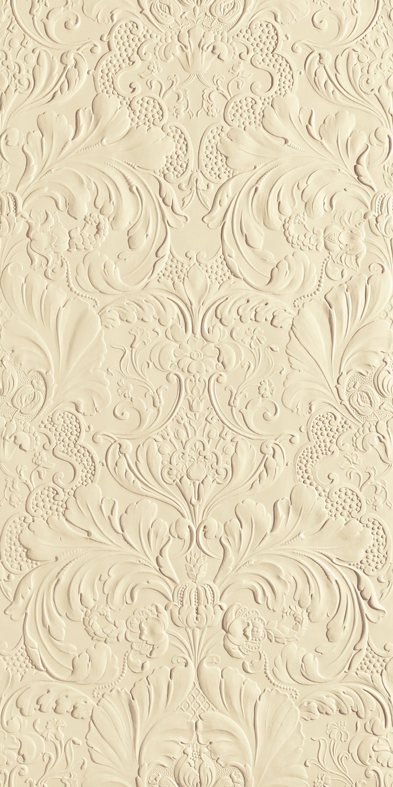 Lincrusta ornate floral wallcovering with embossed scroll pattern in cream finish