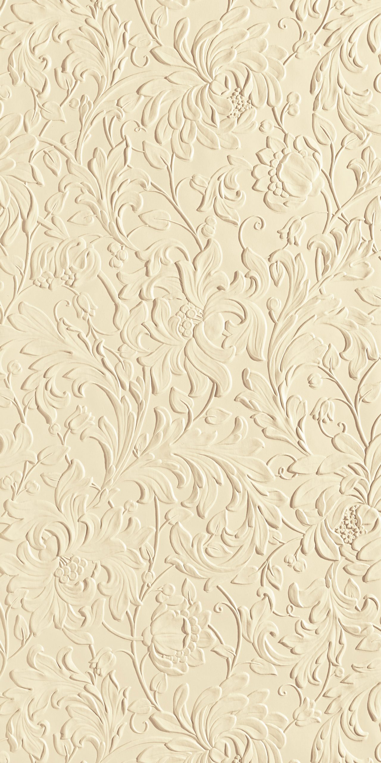 Lincrusta embossed floral wallcovering with flowing botanical leaves and large flower motifs