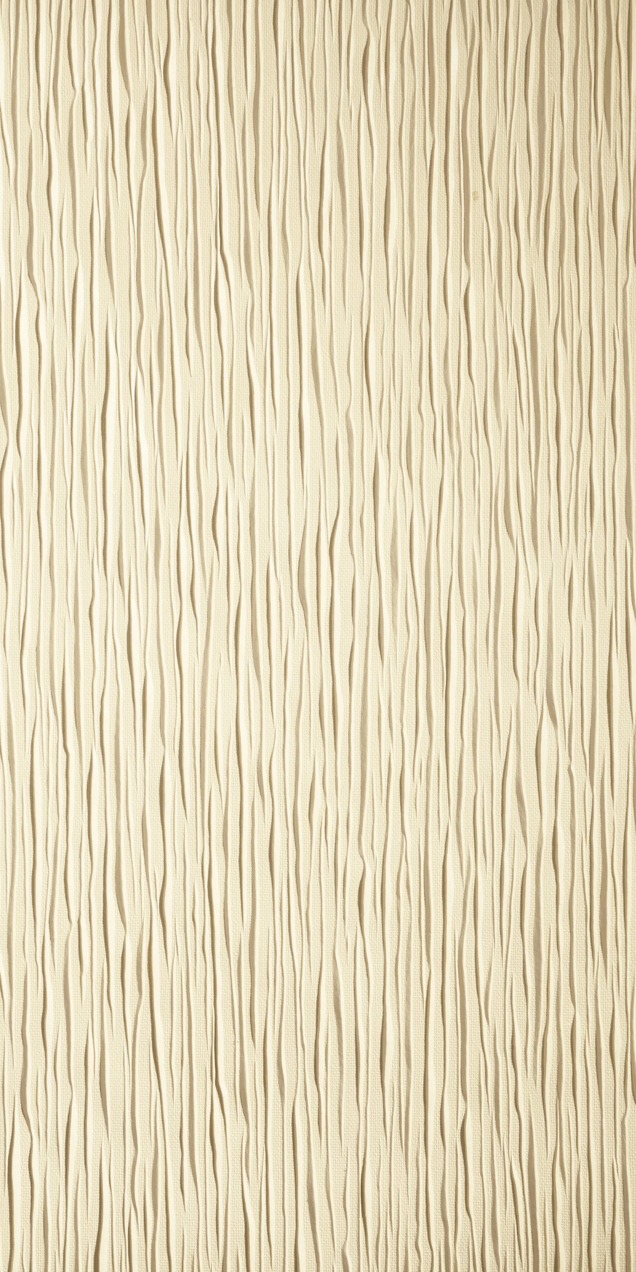 Textured Lincrusta wallcovering with vertical organic embossed pattern in a neutral cream finish