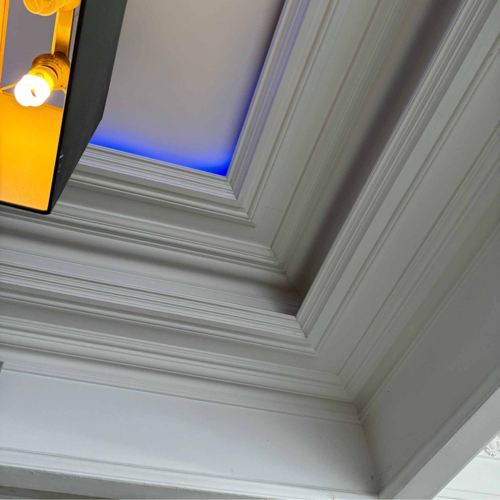 Handcrafted fibrous plaster coffered ceiling with decorative cornice and concealed LED lighting