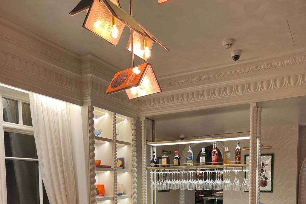 Bespoke plaster cornice and decorative mouldings installed within the Library Bar at The Sloane Club, London.