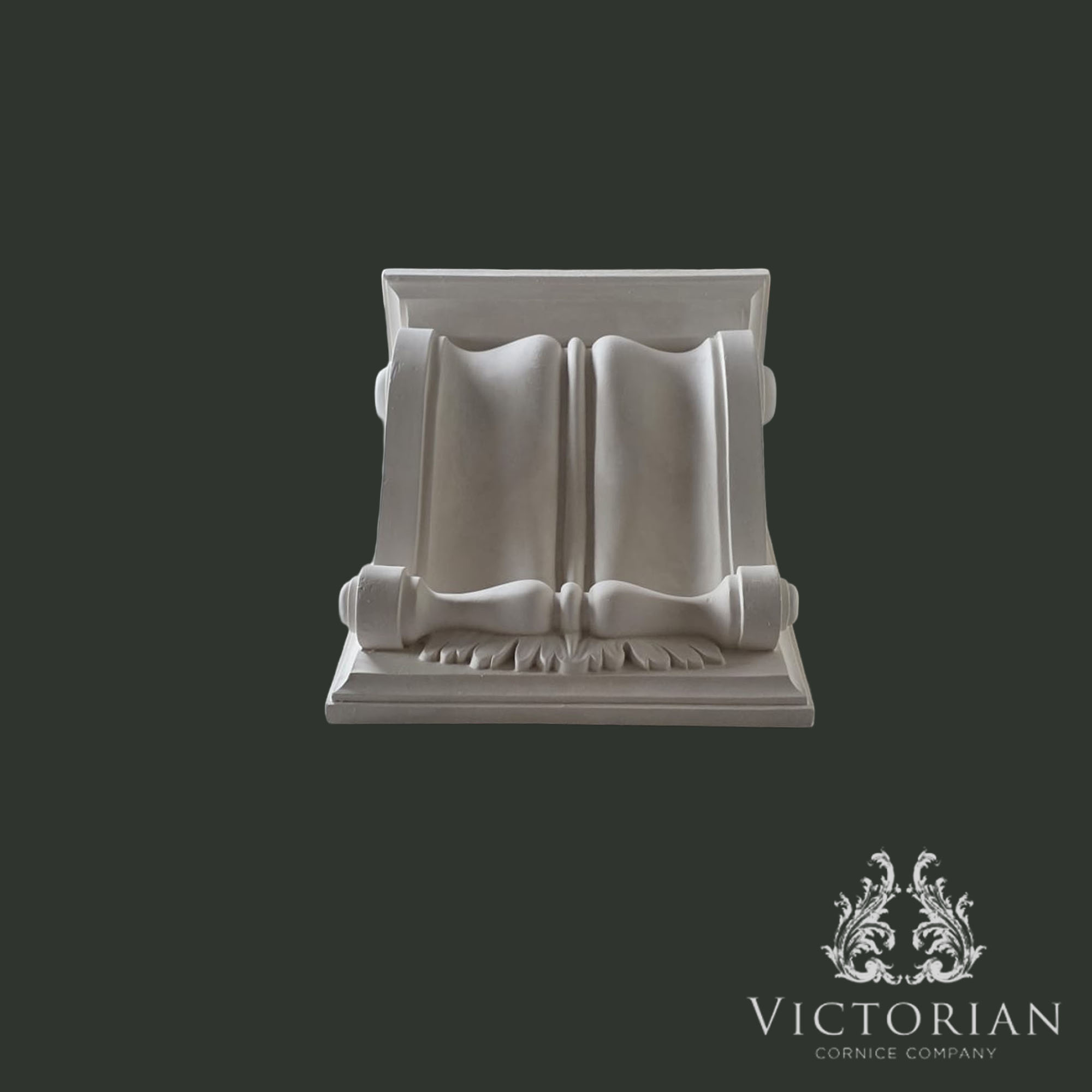 Handmade plain plaster corbel end view with smooth curved detailing