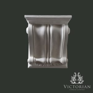 Handmade plain plaster corbel with smooth curved profile front view