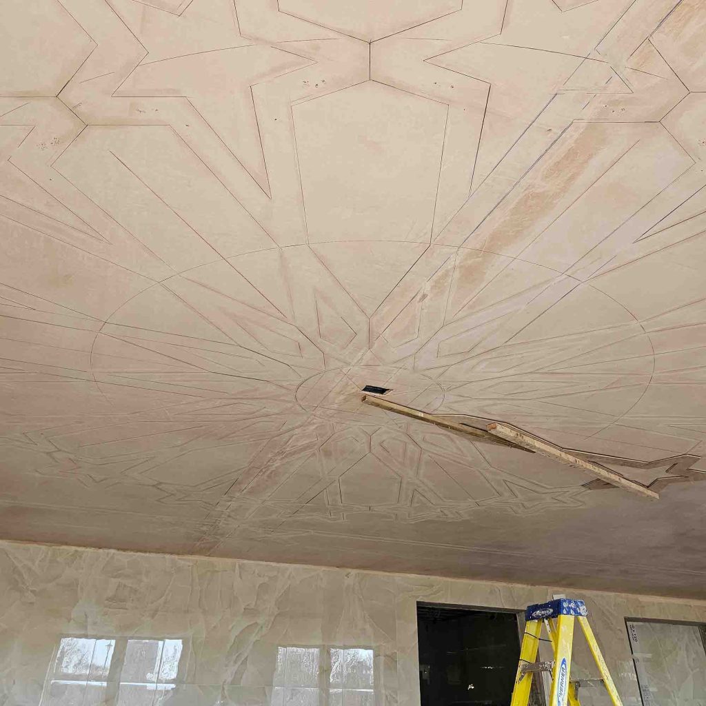 Geometric ceiling design marked out in preparation for plaster installation at Birmingham Central Mosque