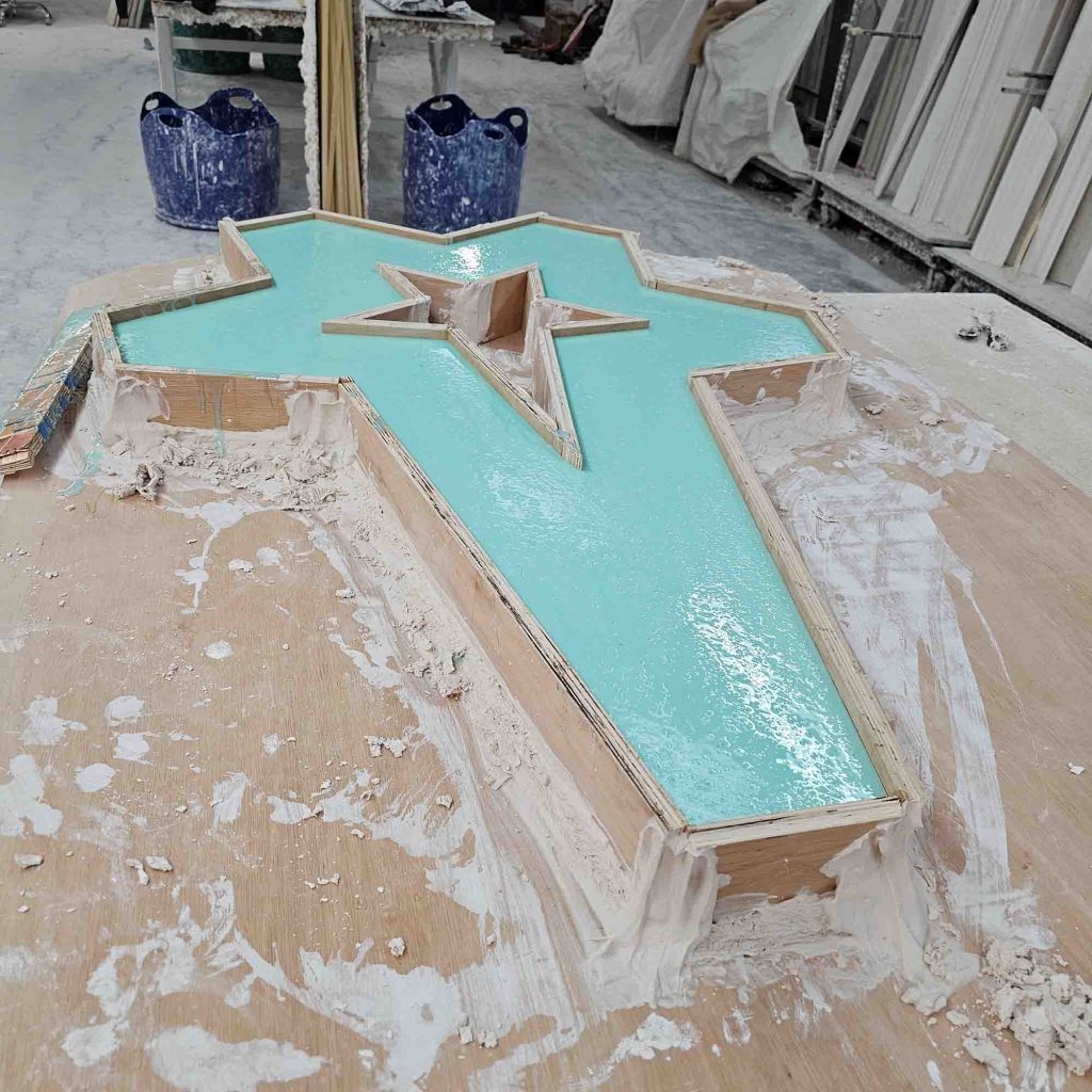 Liquid rubber moulding material poured around a bespoke plaster ceiling shape for Birmingham Central Mosque.
