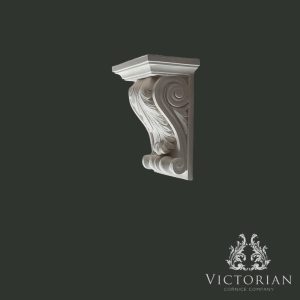 Side view of decorative plaster corbel with acanthus leaf detailing handcrafted in plaster
