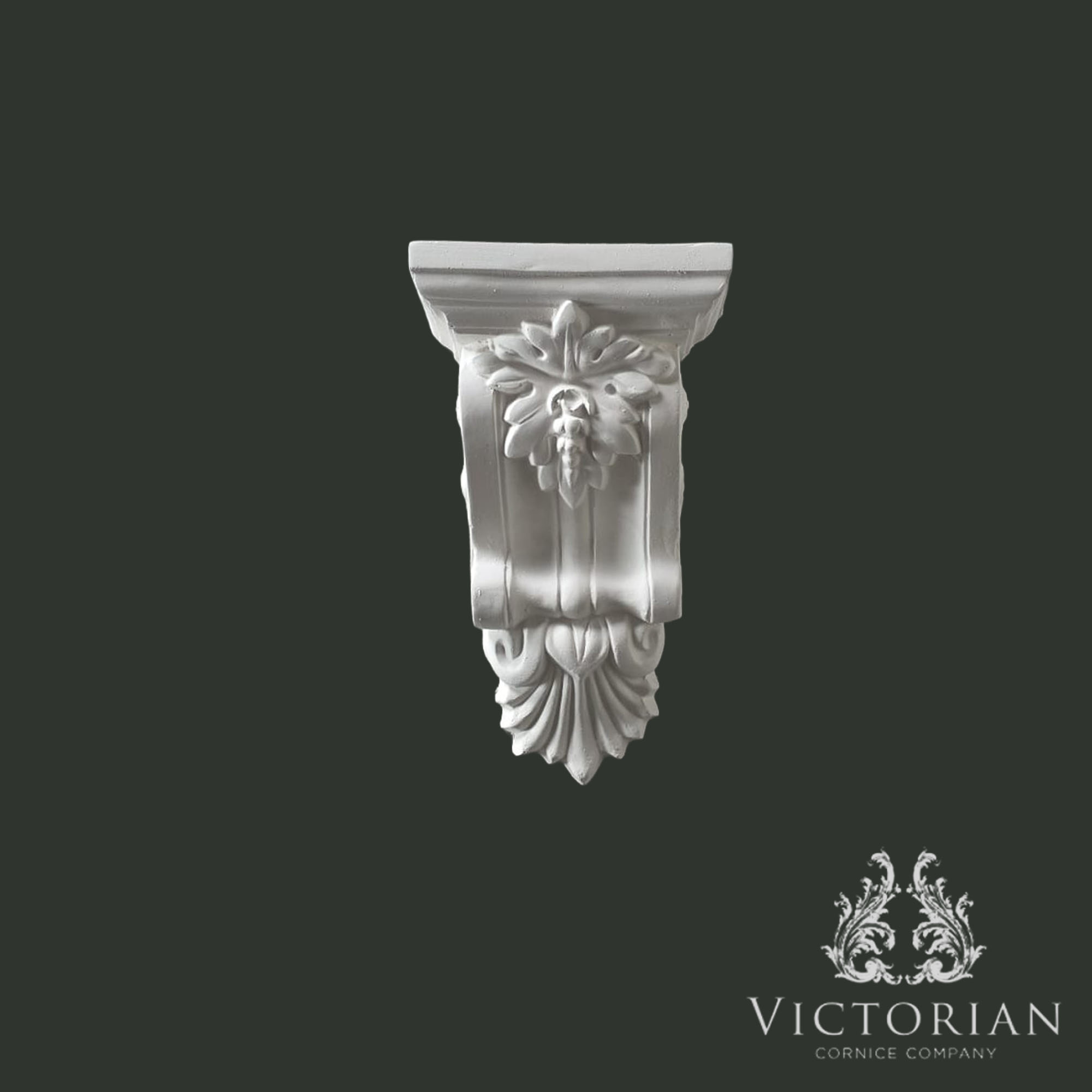 Handmade decorative plaster corbel with leaf and scroll detail front view